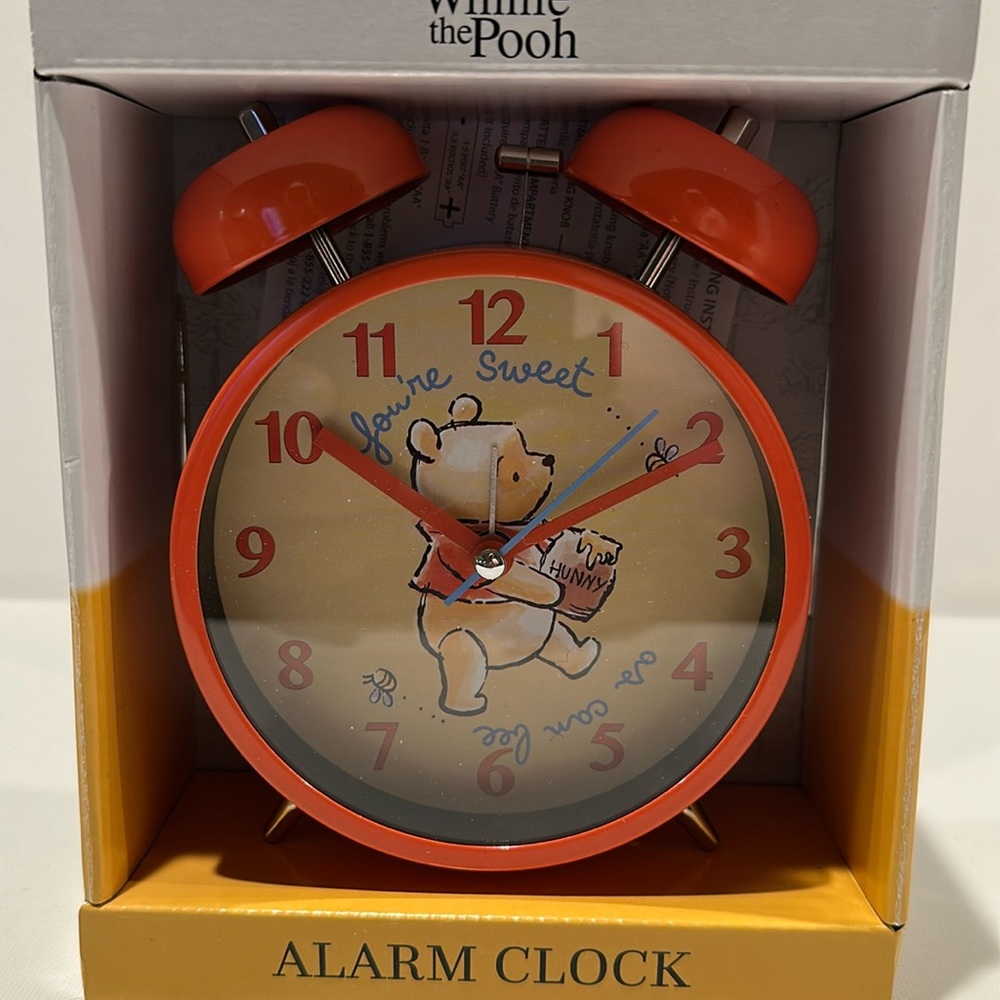 Disney Winnie The Pooh Alarm Clock with Analog Display with large numbers.